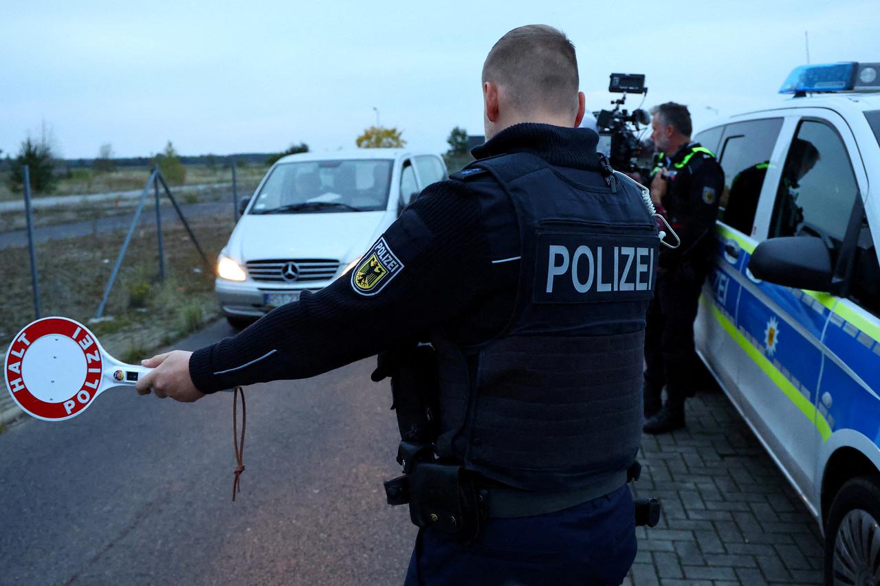 FILE PHOTO: German federal police Bundespolizei officers are pictured during patrol along German-Polish border near Forst
