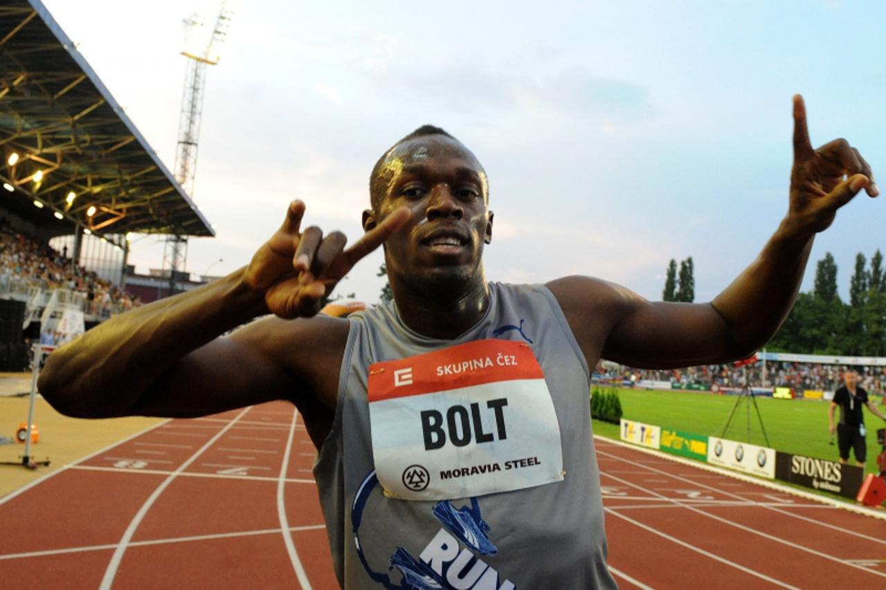 'Usain Bolt of Jamaica gestures after competing in the men\'s 100m sprint on May 31, 2011 at the Zlata Tretra (Golden Spike) athletics meeting in the eastern Czech city of Ostrava. Jamaican athletics 