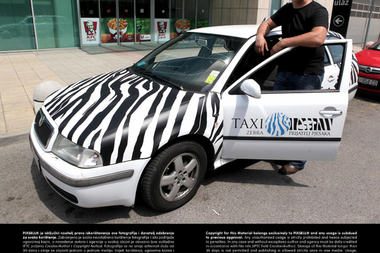 '14.06.2013., Zagreb - Mico Kuzmanovic, sef nove taxi sluzbe Zebra taxi. Photo: Patrik Macek/PIXSELL'