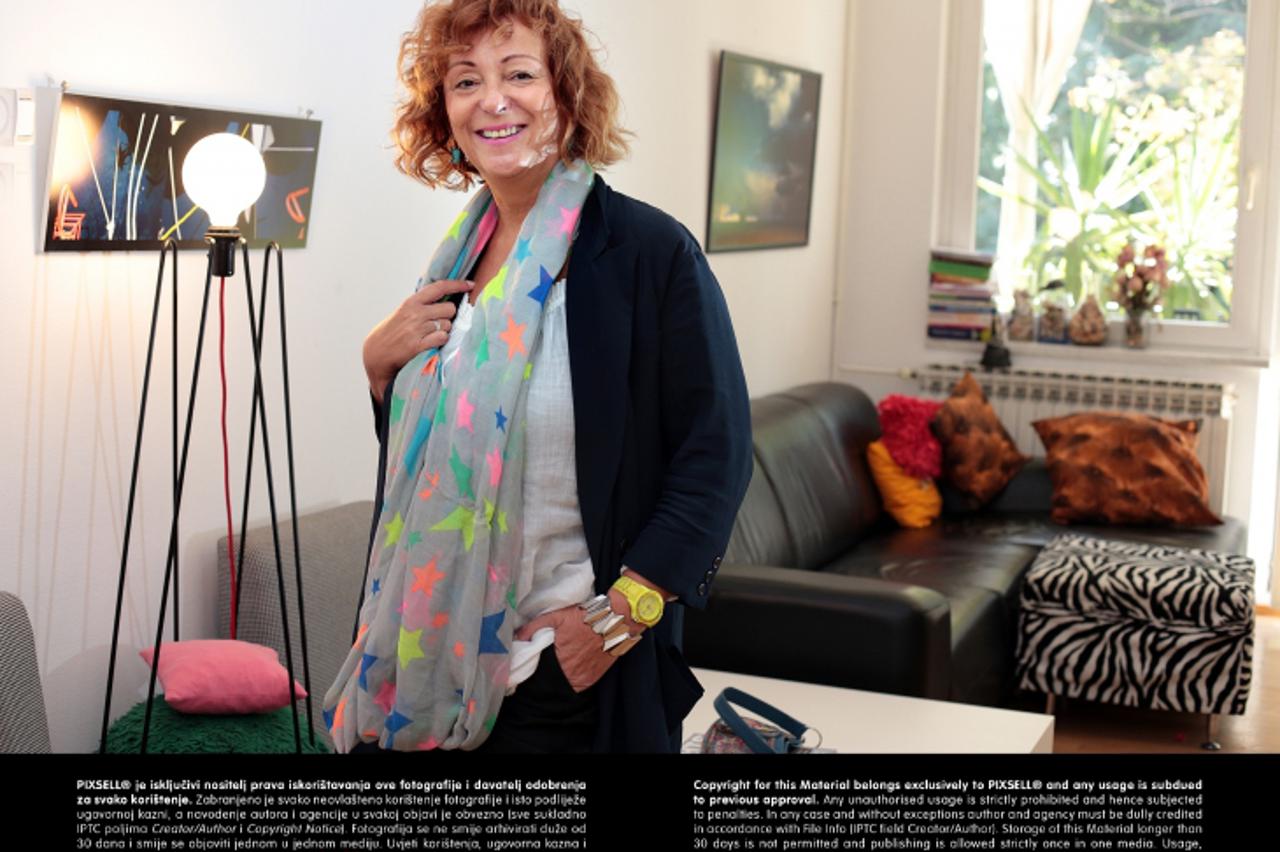 '13.09.2013., Zagreb - Novinarka Sanja Muzaferija povremeno priredjuje izlozbe fotografija u svom stanu.   Photo: Zarko Basic/PIXSELL'