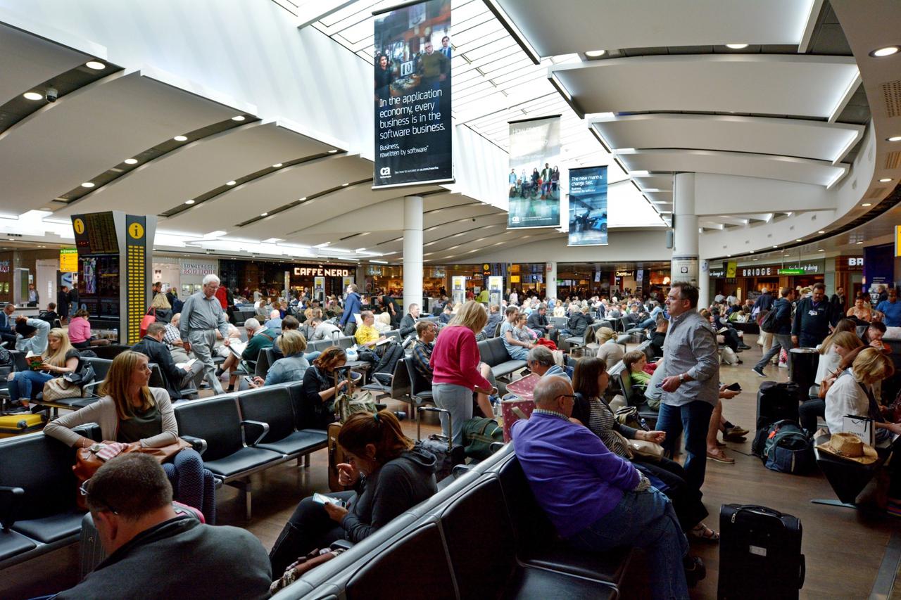 Passengers in Heathrow Airport in London, UK