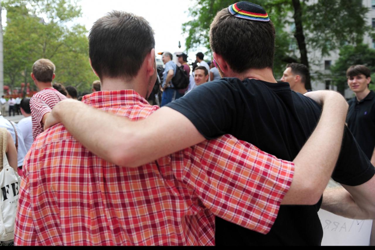 'Atmosphere outside the Manhattan City Clerk\'s office during the first day of gay marriage in New York, NY on Sunday, July 24, 2011. Gay marriages became legal in New York today.
Photo by Guerin-Mous