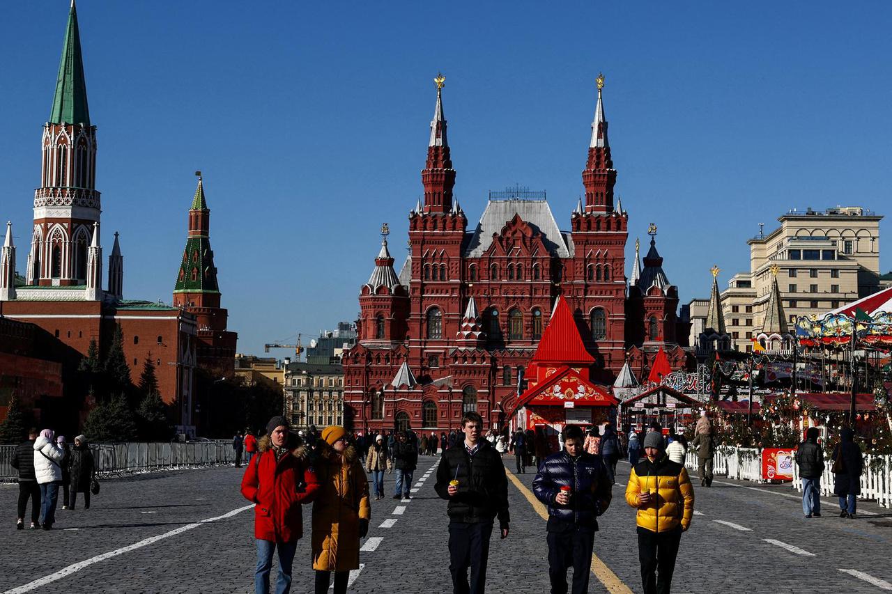 FILE PHOTO: People walk in Red Square in Moscow