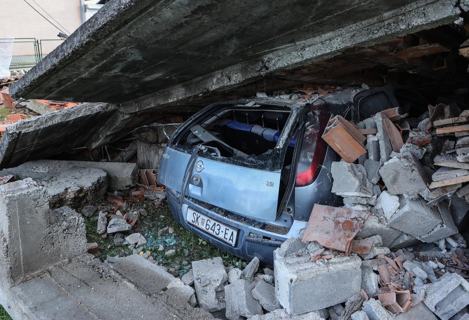 01.01.2021., Petrinja - Posljedice razornog potresa koji je pogodio grad Petrinju. Zatrpan automobil pod rusevinama.
Photo: Marko Prpic/PIXSELL