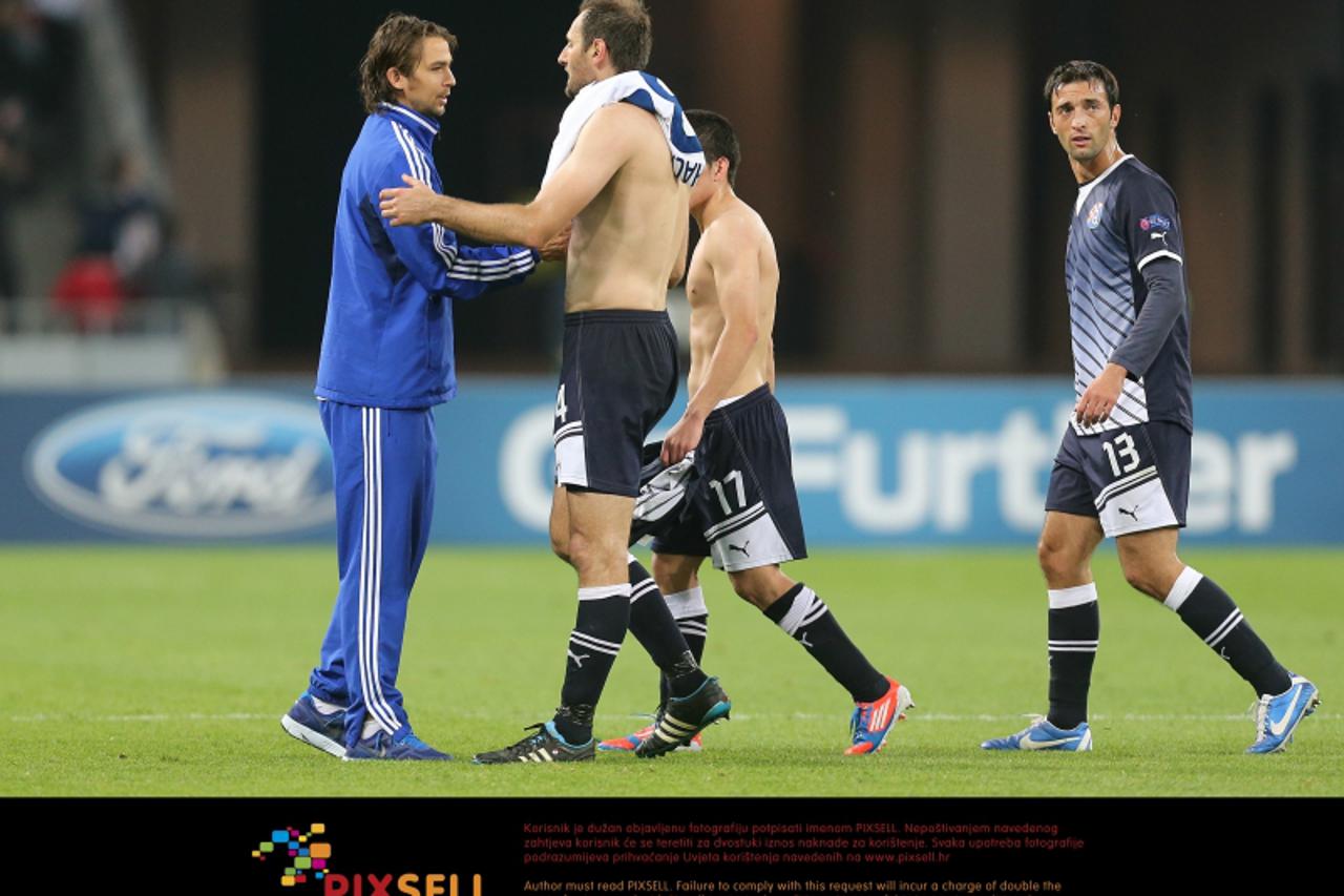 '03.10.2012., Ukrajina, Kijev - Nogometna utakmica UEFA Lige prvaka, GNK Dinamo - FC Dynamo Kijev. Niko Kranjcar, Josip Simunic, Tonel. Photo: Igor Kralj/PIXSELL'