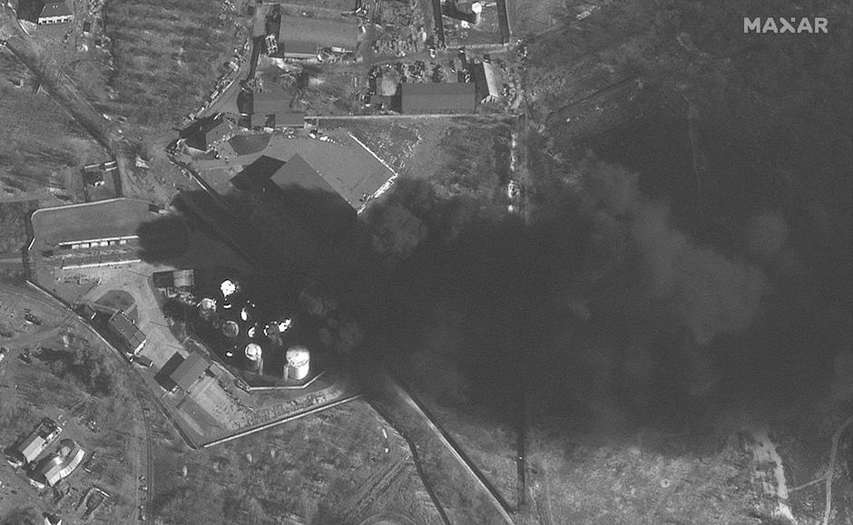 Satellite imagery shows fires at a fuel storage area in Hostomel