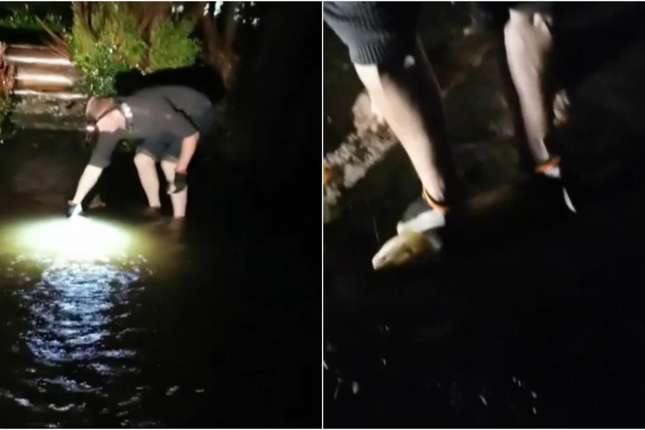 Muškarac na poplavljenom parkiralištu uhvatio lososa