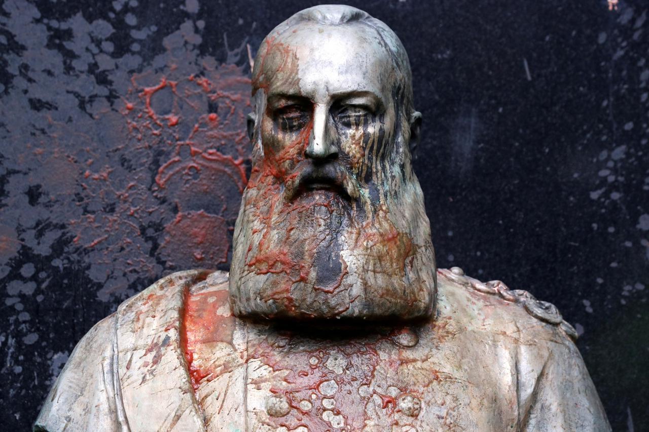 FILE PHOTO: A statue of former Belgian King Leopold II, a controversial figure in the history of Belgium, stands in the city of Ghent