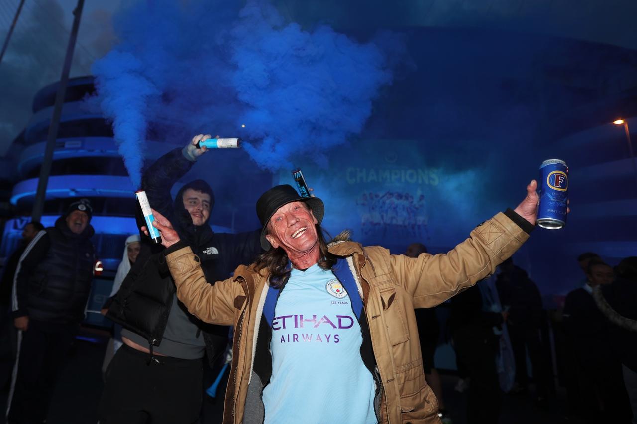 Premier League - Manchester City fans celebrate winning the Premier League