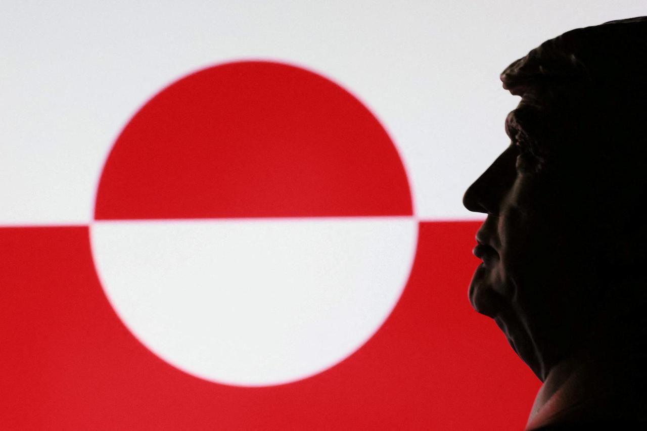 FILE PHOTO: Illustration shows 3D printed miniature of U.S. president Donald Trump and Greenland flag