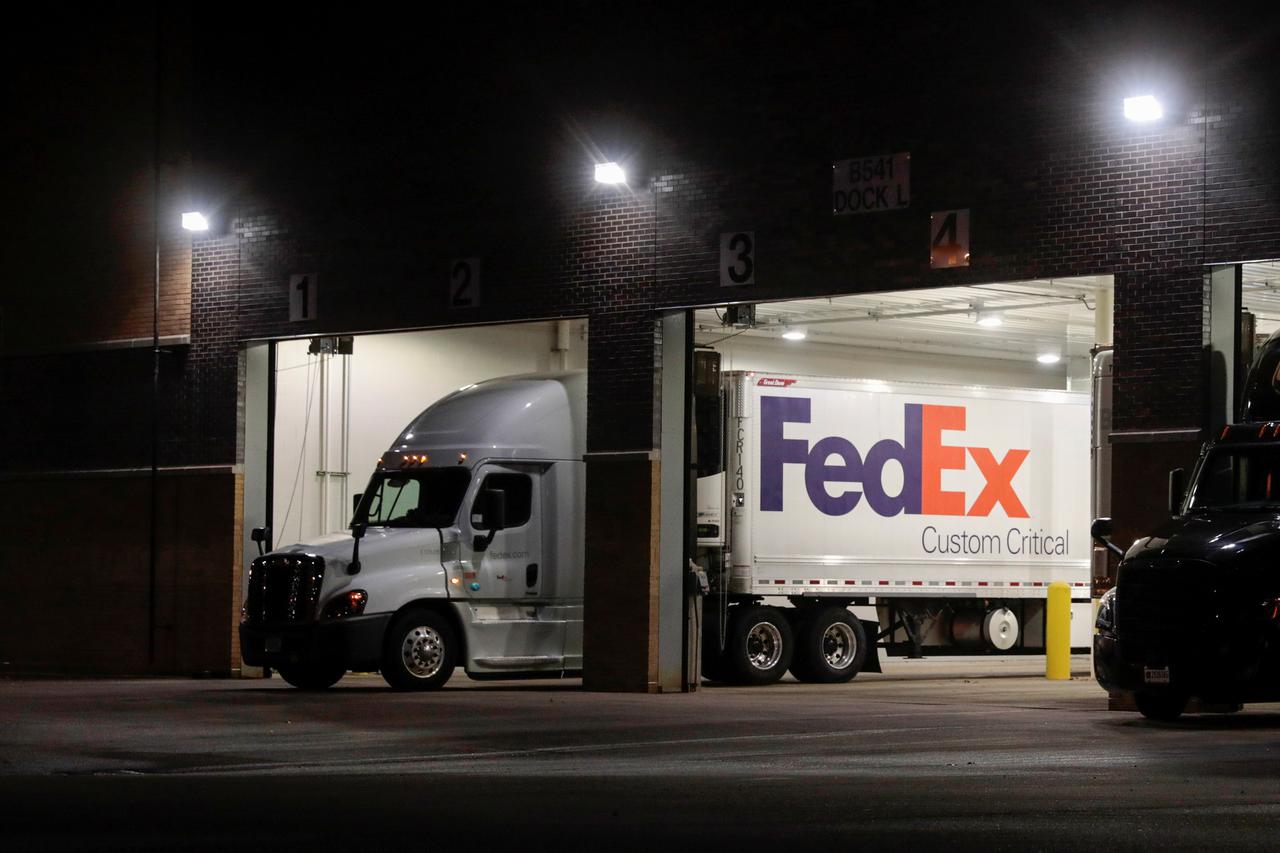 A FedEx truck sits in the dock at the Pfizer Global Supply manufacturing plant in Portage, Michigan