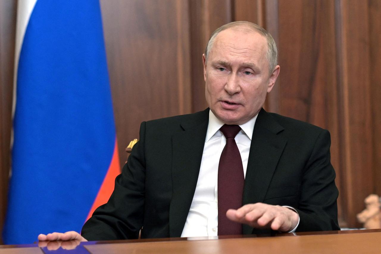 Russian President Vladimir Putin delivers a video address to the nation in Moscow