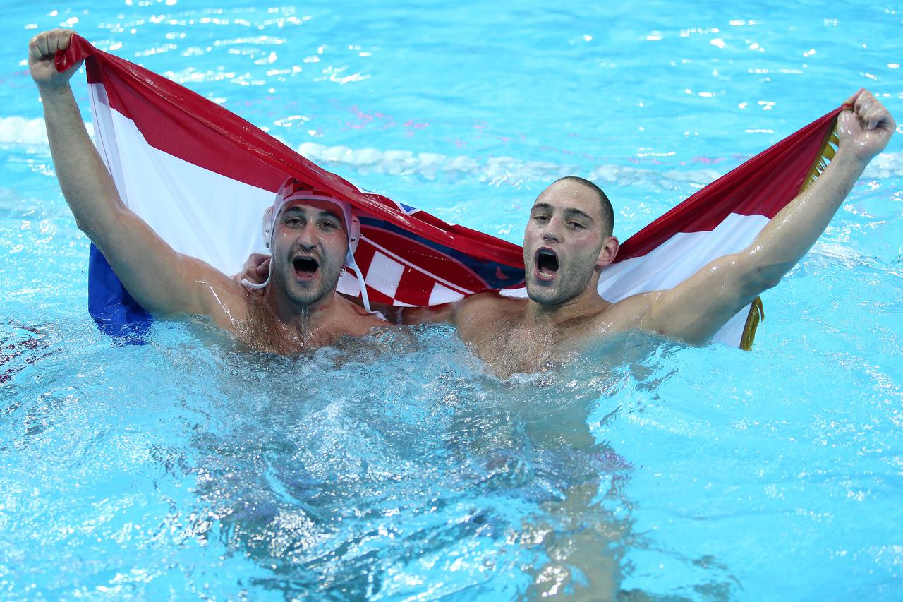 12.08.2012., London, Engleska - Ljetne Olimpijske igre, vaterpolo, finale, Hrvatska - Italija. Niksa Dobud, Paulo Obradovic. Photo: Igor Kralj/PIXSELL