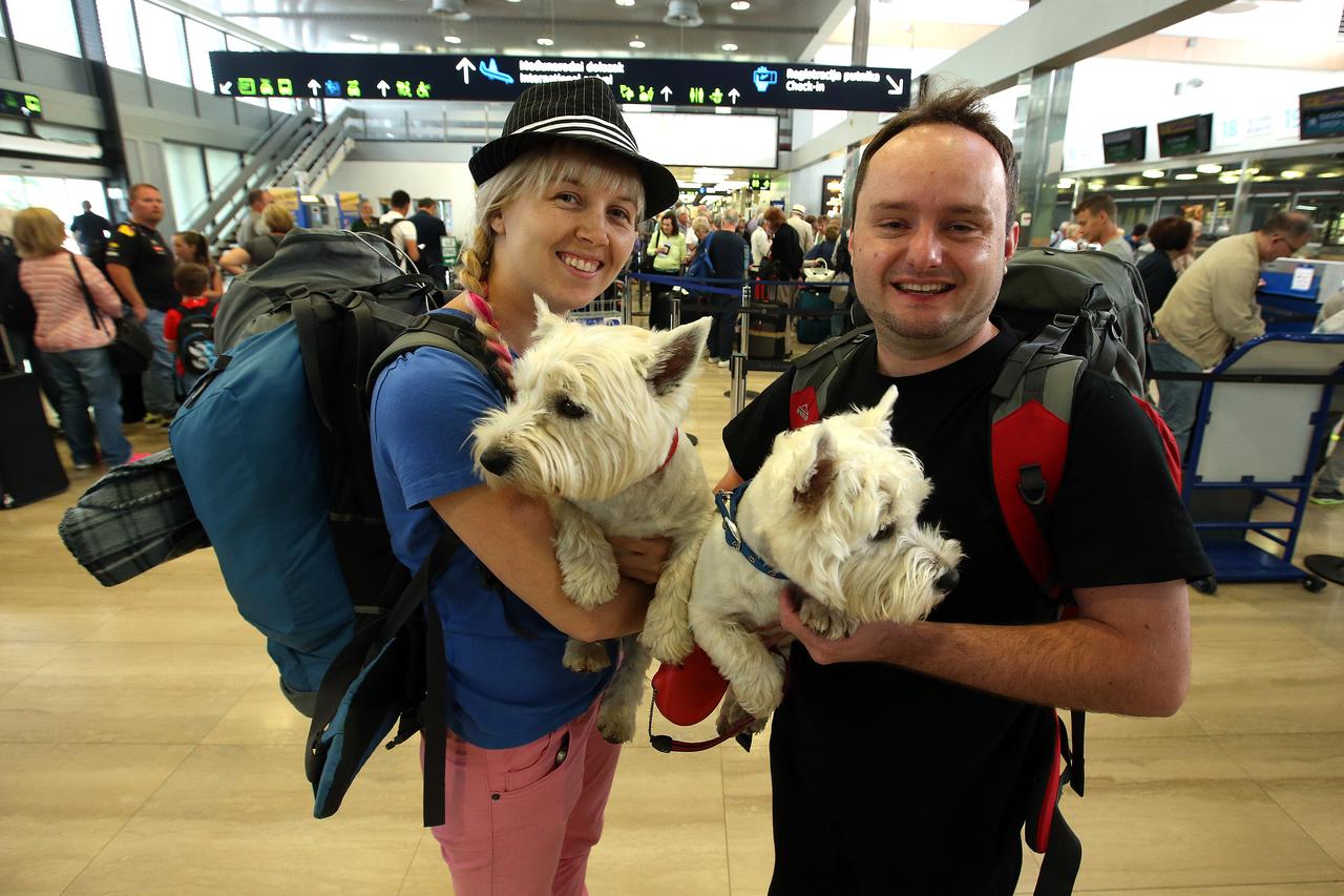 17.06.2015., Zagreb - Iva Mihalic i Branko Krcmar, pokretaci bloga Putoholicari, krenuli iz Zracne luke Zagreb na put oko svijeta u 45 dana. Photo: Robert Anic/PIXSELL