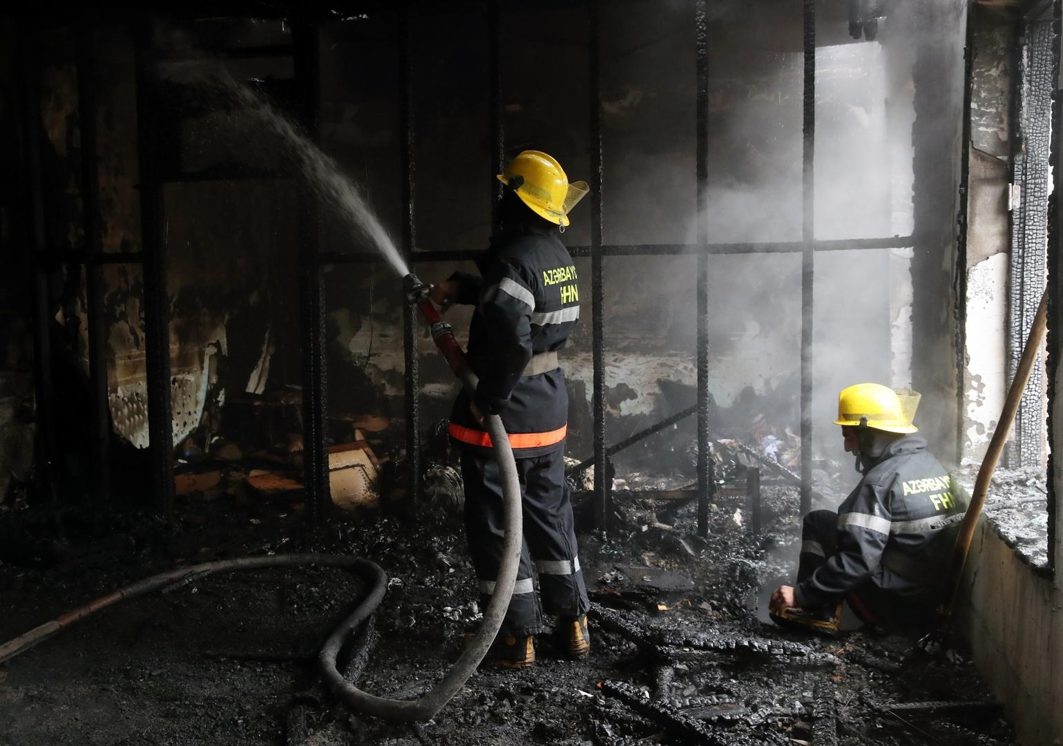 BARDA, AZERBAIJAN - OCTOBER 5, 2020: Firefighters battle a fire at a residential building damaged in a shelling attack. The situation in Nagorno-Karabakh escalated on September 27, 2020, with reports from Yerevan on the Azerbaijani troops advancing in the direction of Nagorno-Karabakh and shelling its settlements, including the capital city of Stepanakert. Both Azerbaijan and Armenia have declared martial law and military mobilization, reporting on casualties and injuries among civilians as well. Valery Sharifulin/TASS Photo via Newscom Newscom/PIXSELL