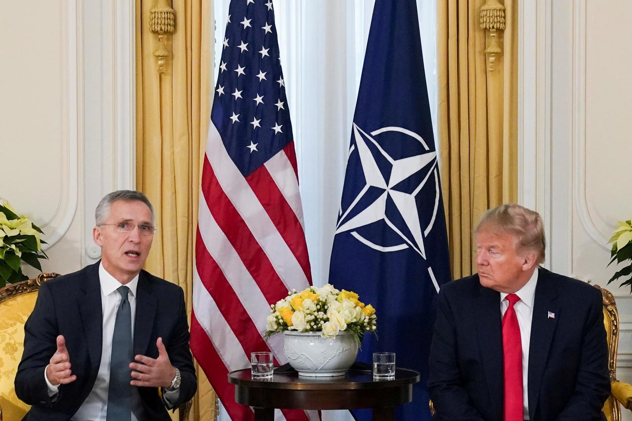 FILE PHOTO: U.S. President Trump meets with NATO Secretary General Stoltenberg, ahead of the NATO summit, in London