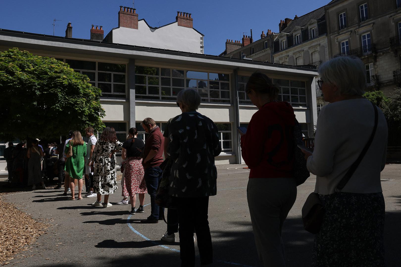 People queue to vote in the first round of the early French parliamentary elections,outside a polling station in Nantes, France, June 30, 2024. REUTERS/Violeta Santos Moura Photo: VIOLETA SANTOS MOURA/REUTERS