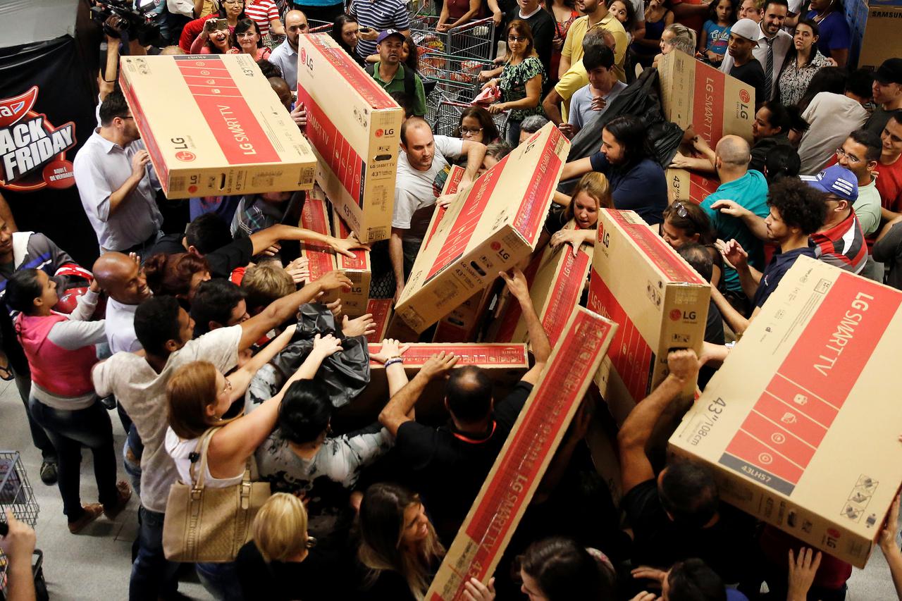 Shoppers reach for television sets as they compete to purchase retail items on Black Friday at a store in Sao Paulo Shoppers reach for television sets as they compete to purchase retail items on Black Friday at a store in Sao Paulo, Brazil, November 24, 2