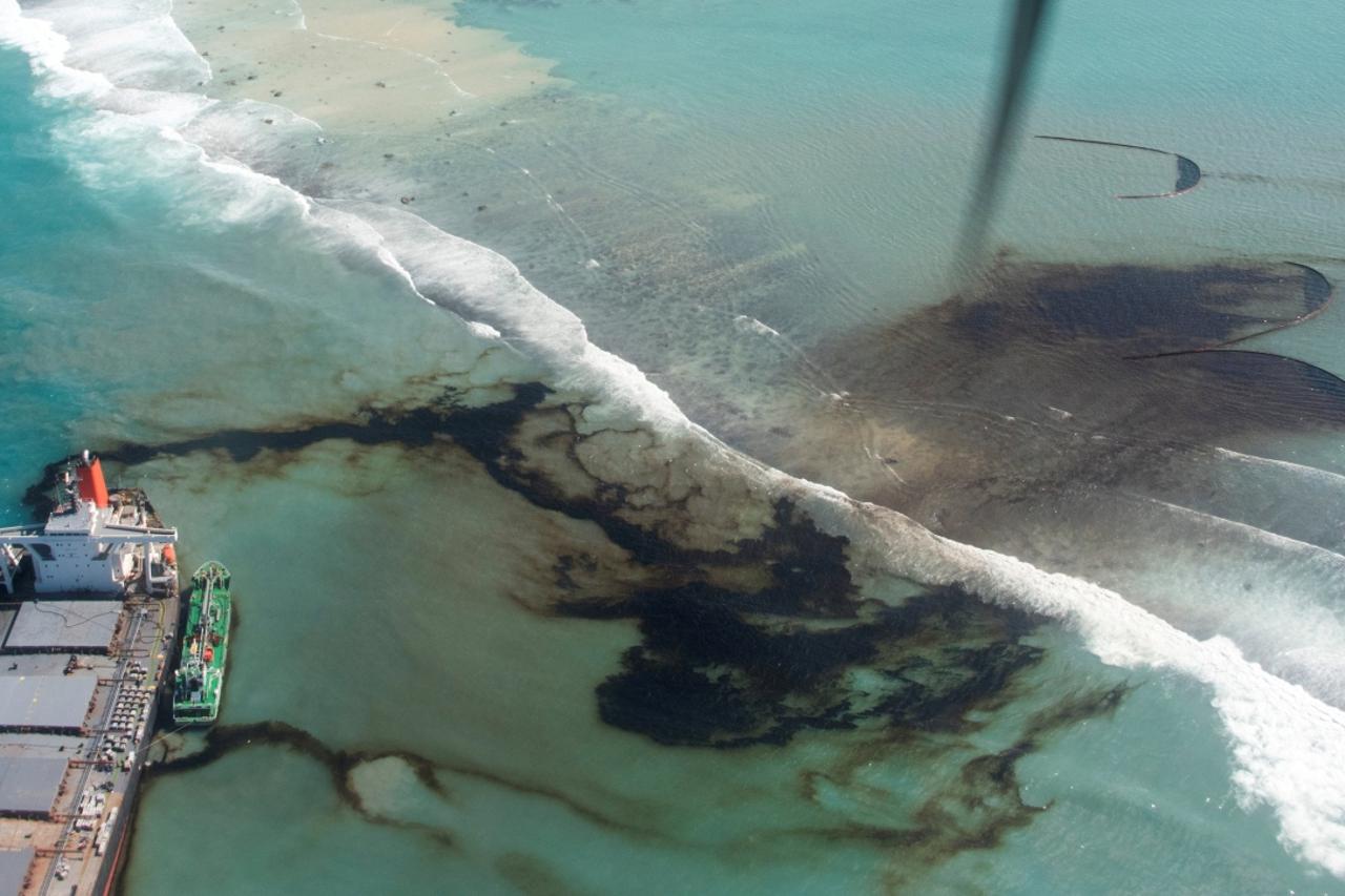 FILE PHOTO: A general view shows the bulk carrier ship MV Wakashio, that ran aground on a reef, at Riviere des Creoles