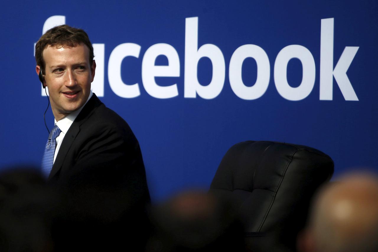 Facebook CEO Mark Zuckerberg is seen on stage during a town hall at Facebook's headquarters in Menlo Park, California September 27, 2015. REUTERS/Stephen Lam/File Photo