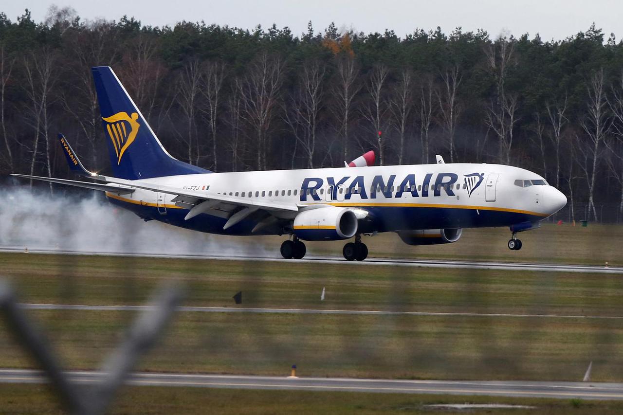 FILE PHOTO: A Ryanair aircraft lands at the airport in Modlin near Warsaw
