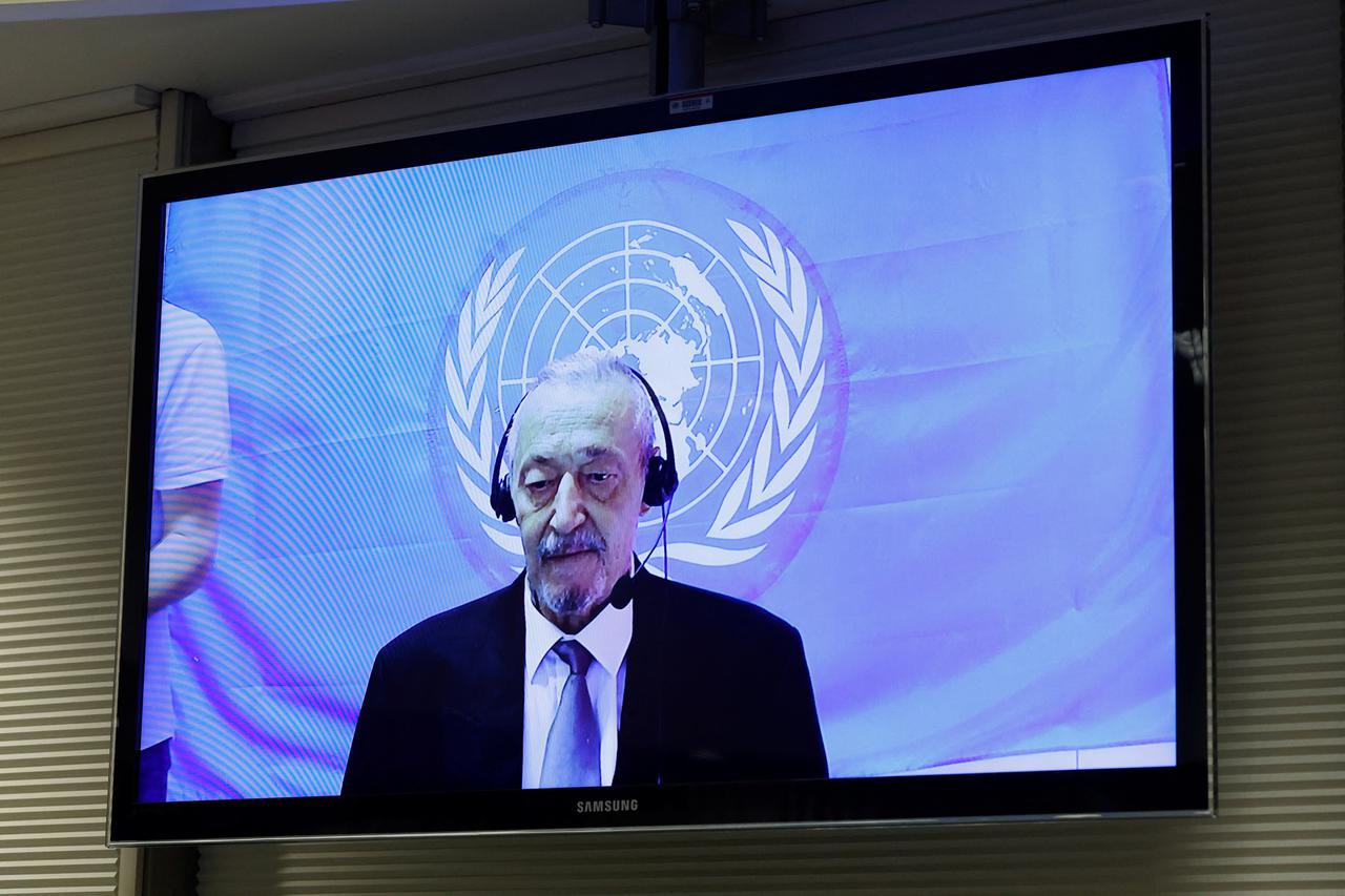 Franko "Frenki" Simatovic appears on a screen in court, in The Hague