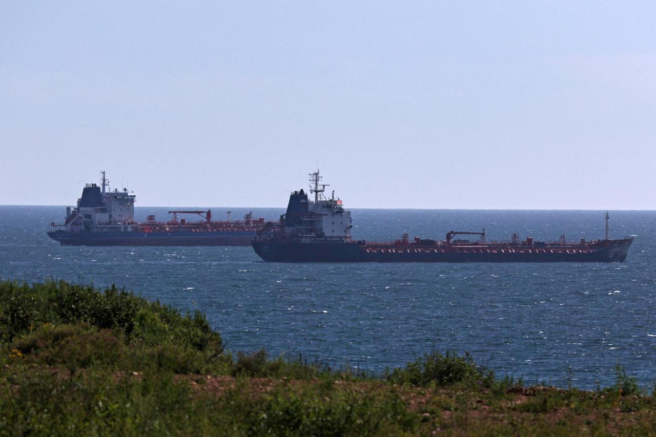 FILE PHOTO: Oil tankers sail along Nakhodka Bay near the port city of Nakhodka