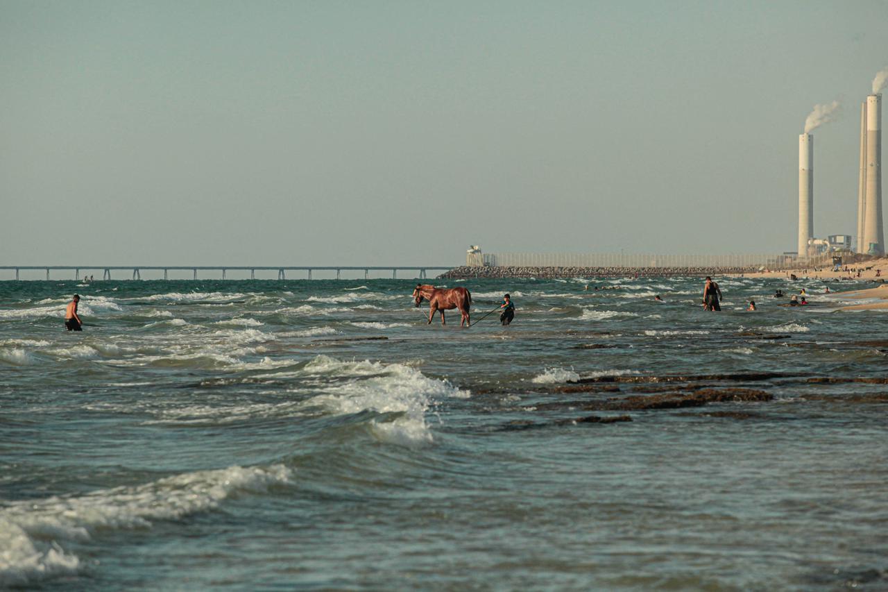 Palestinians Rest On The Beach - Gaza