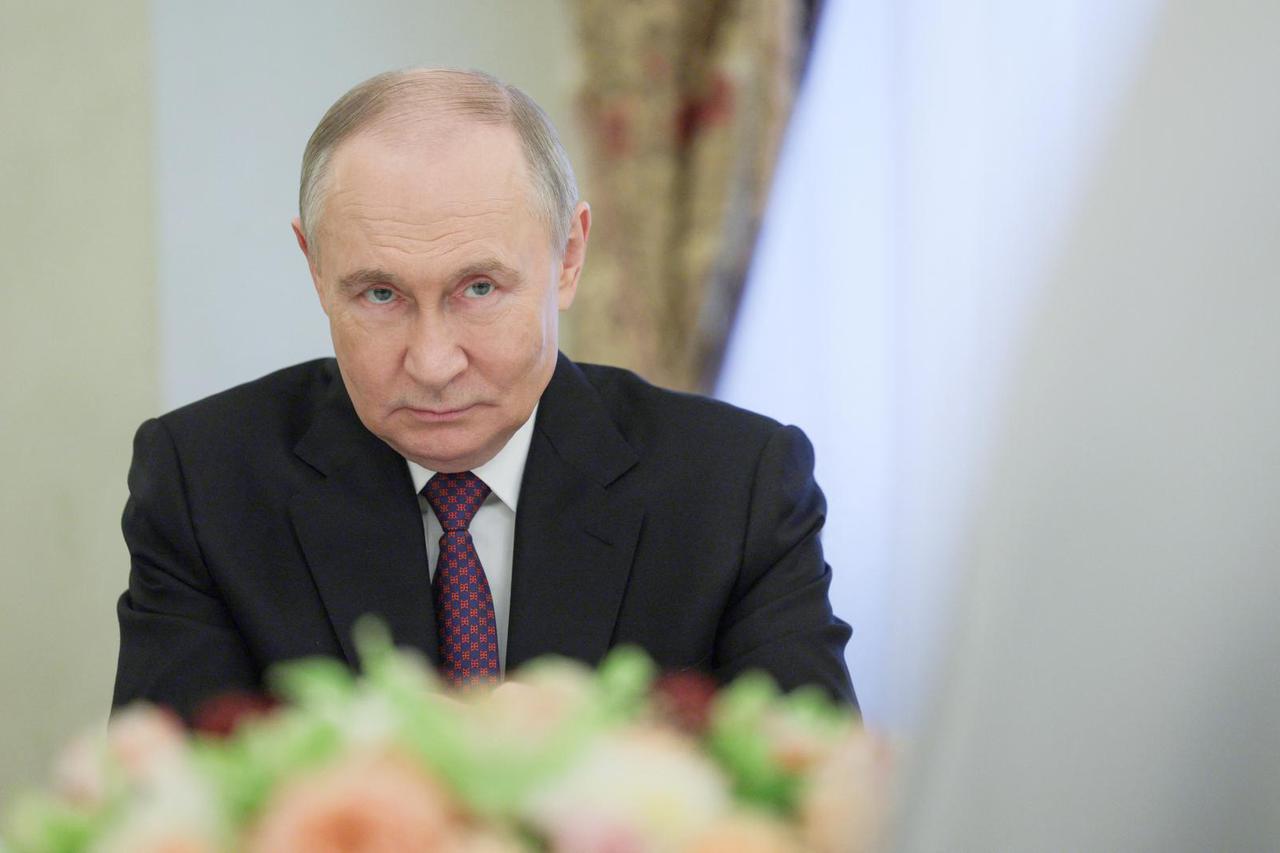 Russian President Vladimir Putin welcomes Serbian Patriarch Porfirije in Moscow