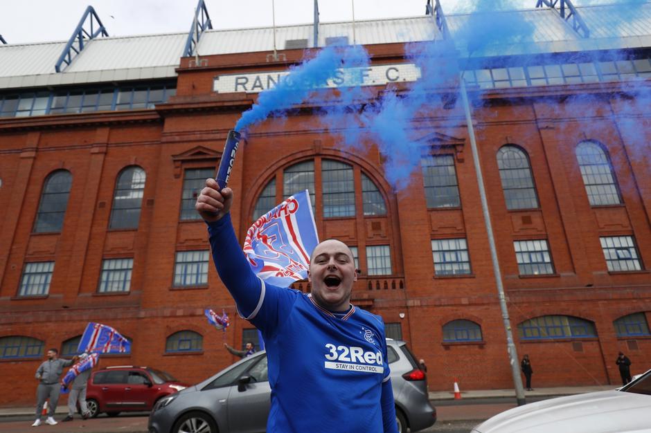 Rangers fans celebrate winning the Scottish Premiership Title