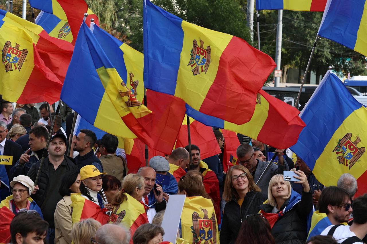 Supporters of Moldova's pro-European Party of Action and Solidarity (PAS) hold a rally in Chisinau