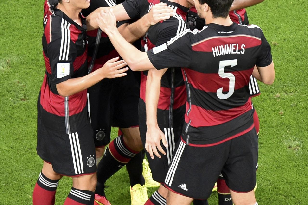 Germany's Miroslav Klose (2nd L) celebrates their second goal with team mates during their 2014 World Cup semi-finals against Brazil at the Mineirao stadium in Belo Horizonte July 8, 2014. REUTERS/Francois Xavier Marit/Pool  (BRAZIL  - Tags: SOCCER SPORT 