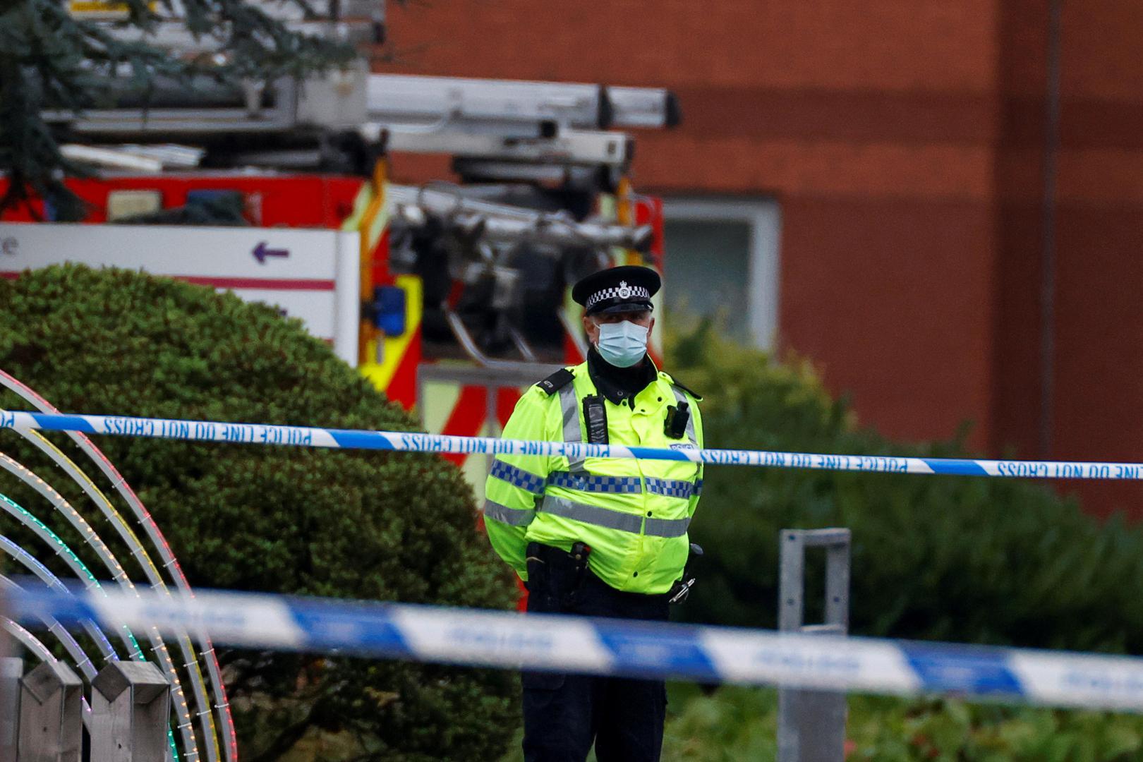 A police officer keeps guard near the scene of a car blast outside Liverpool Women's Hospital, in Liverpool, Britain, November 15, 2021. REUTERS/Phil Noble