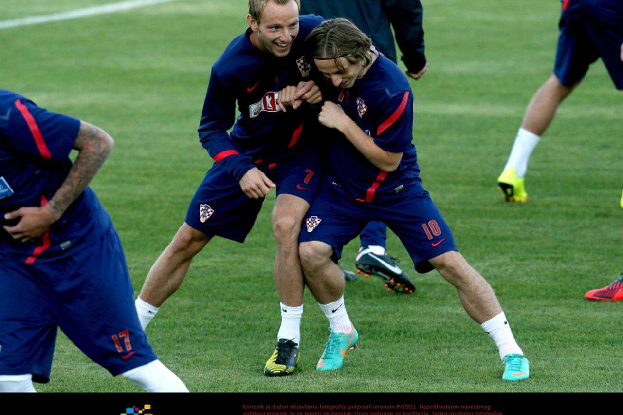 '08.10.2012., Trening kamp Zagrebello, Zagreb - Trening hrvatske nogometne reprezentacije. Ivan Rakitic, Luka Modric Photo: Marko Lukunic/PIXSELL'