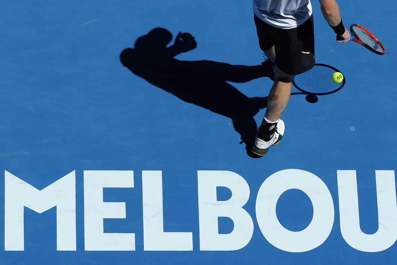 Tennis - Australian Open - Melbourne Park, Melbourne, Australia - 22/1/17 Britain's Andy Murray prepares to serve during his Men's singles fourth round match against Germany's Mischa Zverev. REUTERS/Jason Reed