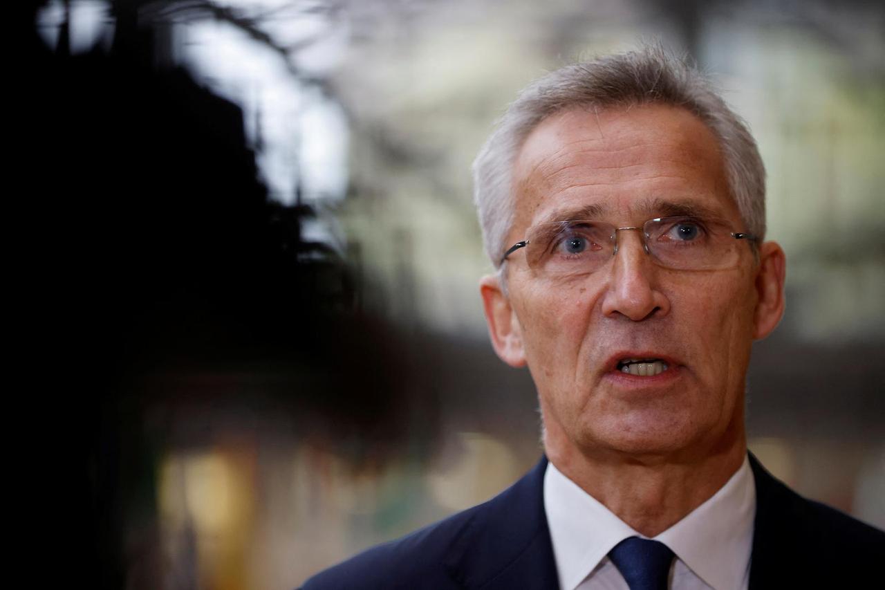 NATO Secretary General Stoltenberg speaks to journalists before a meeting of EU Defence ministers in Brussels