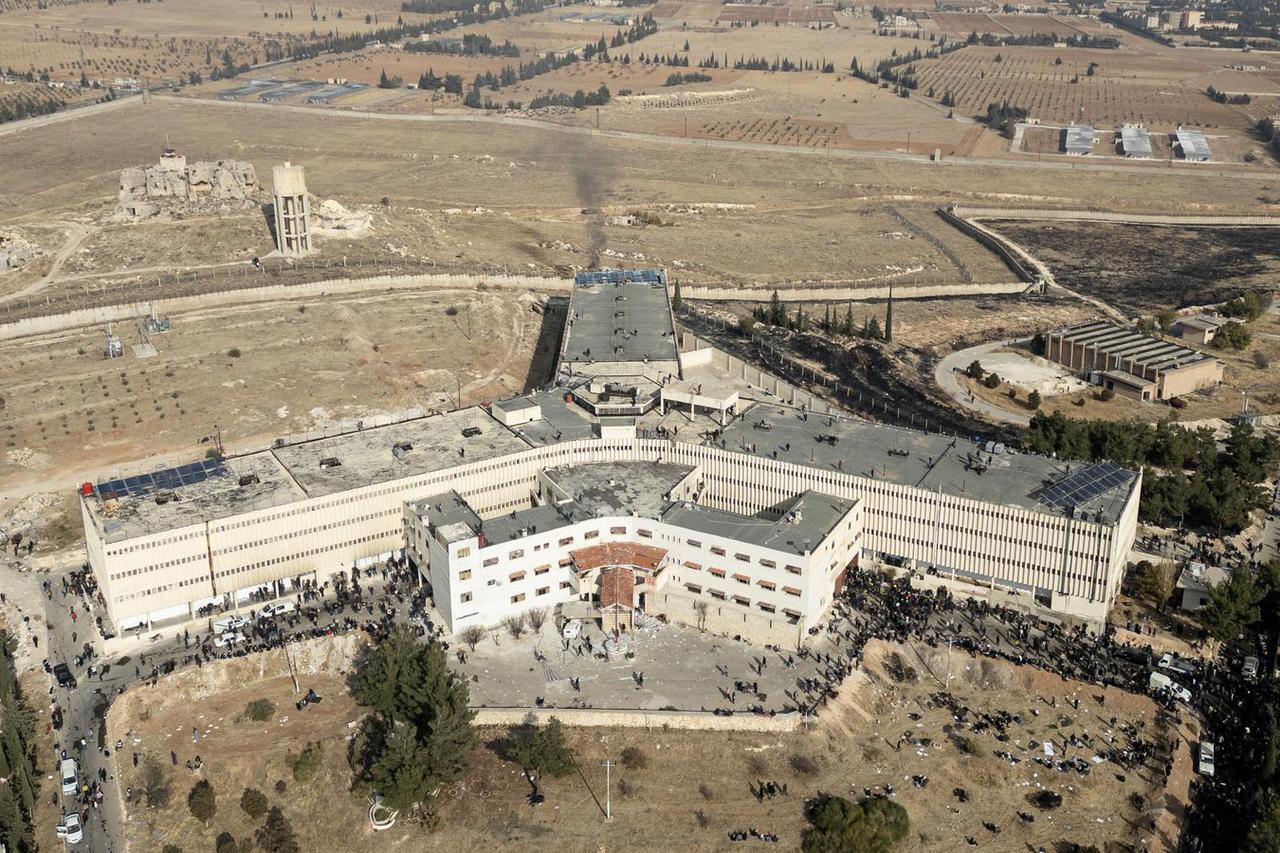 People search for prisoners at Sednaya prison