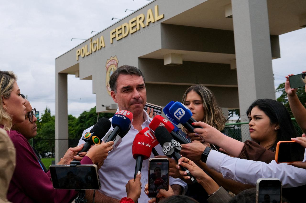 FILE PHOTO: Senator Flavio Bolsonaro visits his father at a Federal Police building in Brasilia