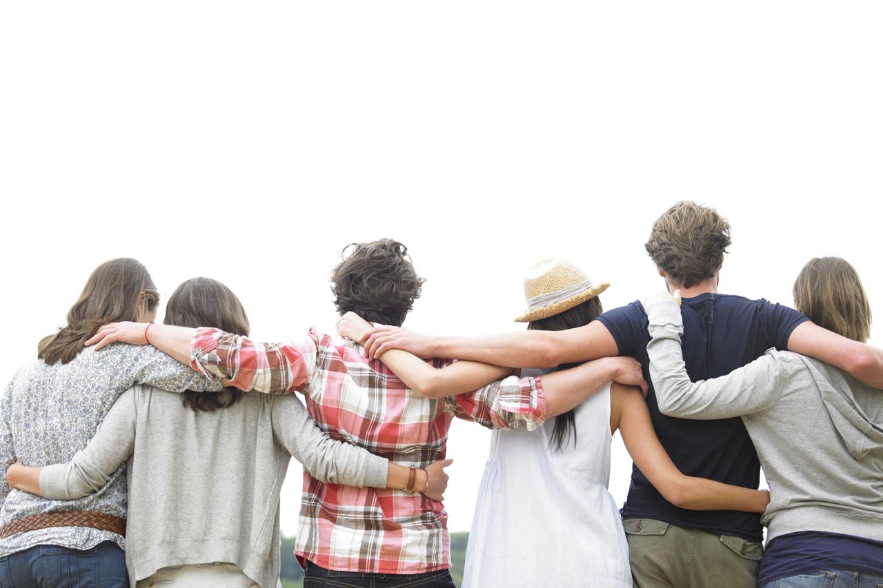 Rear View of Group of Friends Hugging
