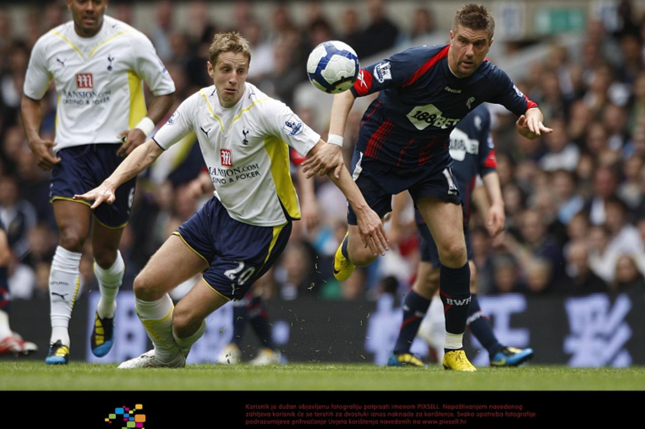'Bolton Wanderers\' Ivan Klasnic (right) and Tottenham Hotspur\'s Michael Dawson battle for the ball Photo: Press Association/Pixsell'