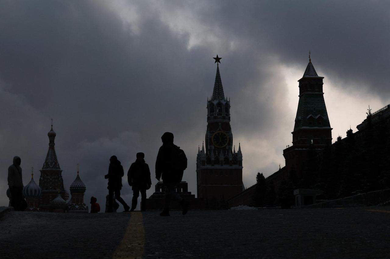 People walk in Red Square in central Moscow
