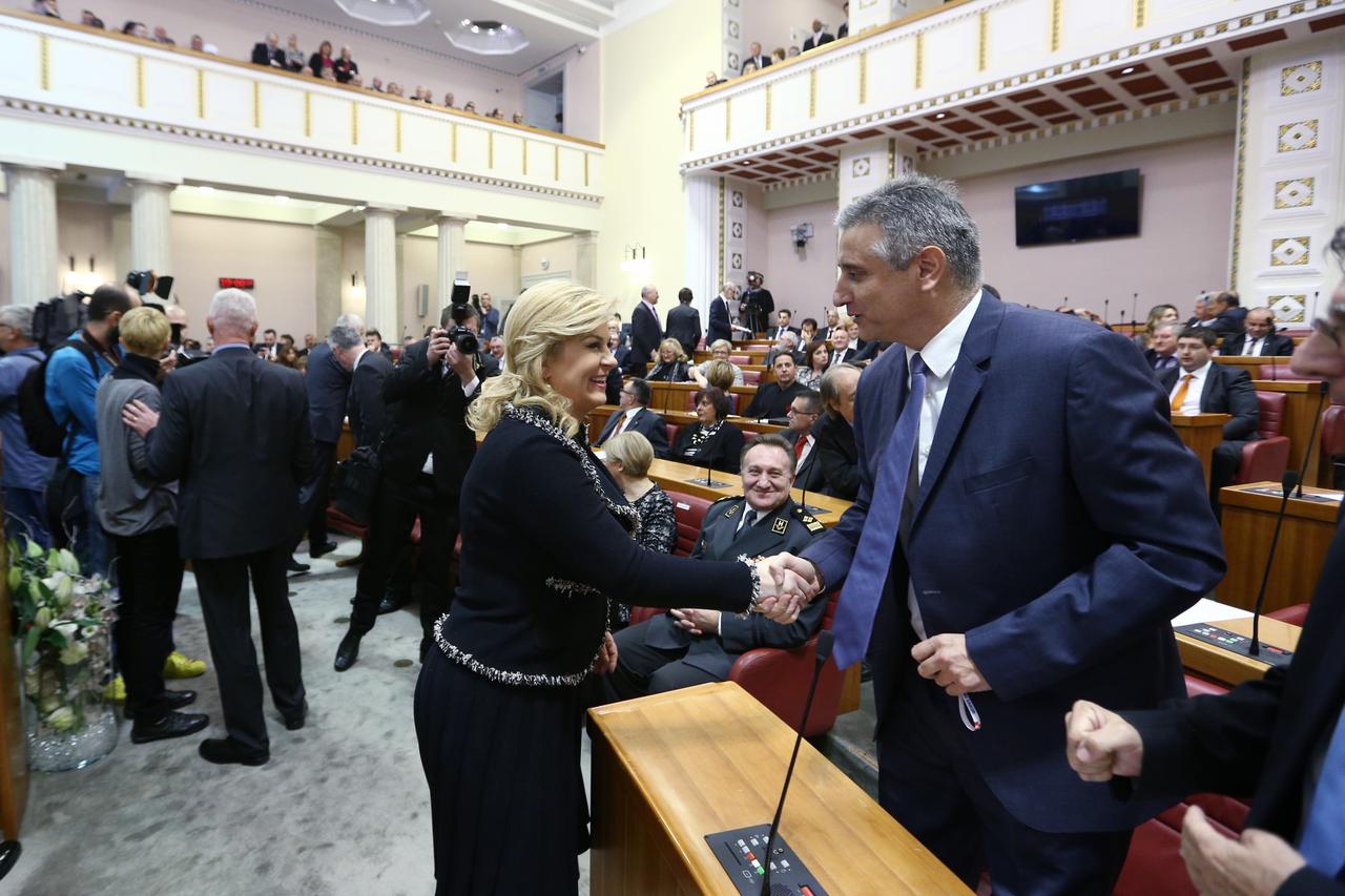 03.12.2015., Markov trg, Zagreb - Odrzana je prva konstituirajuca sjednica osmog saziva Hrvatskog sabora. Kolinda Grabar Kitarovic, Tomislav Karamarko. Photo: Zeljko Lukunic/PIXSELL
