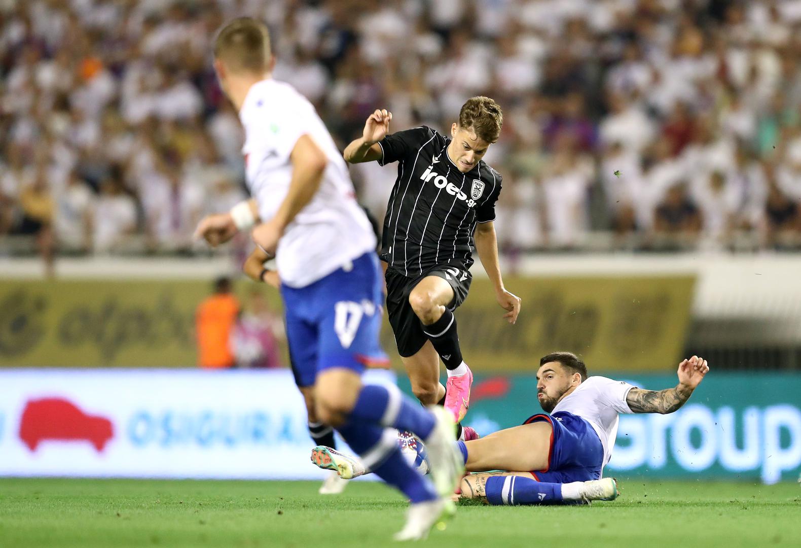 10.08.2023., stadion Poljud, Split - Prva utakmica 3. pretkola UEFA Konferencijske lige, HNK Hajduk - PAOK.  Ioannis Konstantelias, Zvonimir Sarlija Photo: Matija Habljak/PIXSELL
