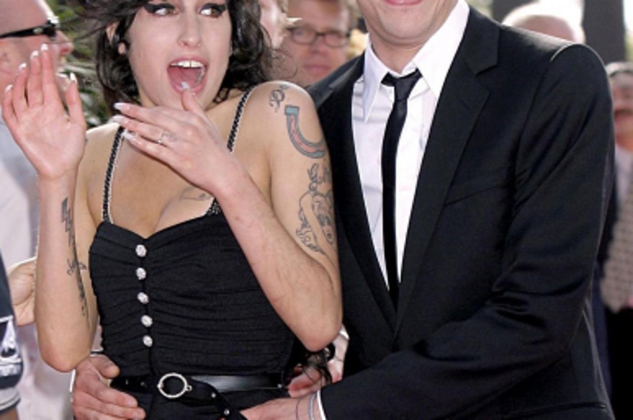 'File photo dated 03/06/07 of Blake Fielder-Civil with Amy Winehouse who has been found dead at her flat. Photo: Press Association/Pixsell'