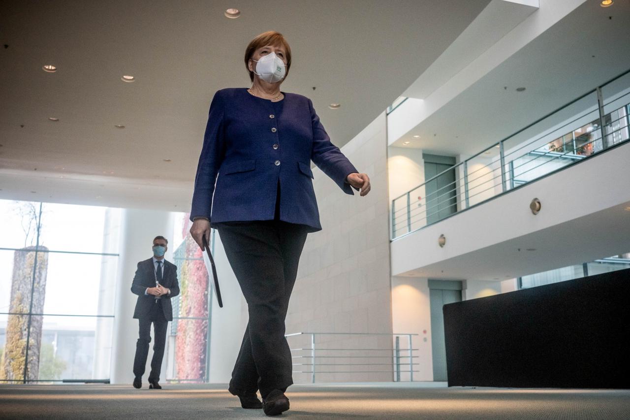 FILE PHOTO: German Chancellor Angela Merkel gives a statement on 2020 U.S. presidential election in Berlin