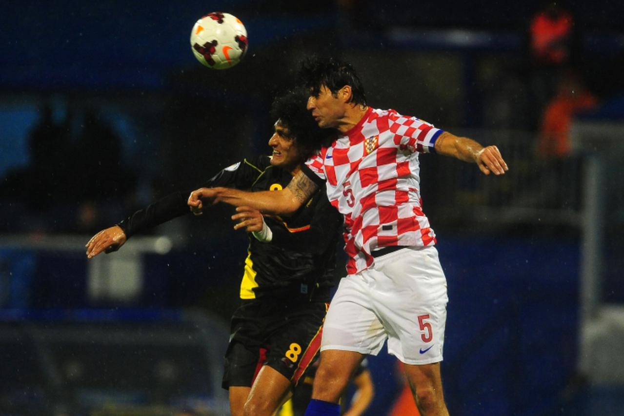 '11.10.2013., stadion Maksimir, Zagreb - Kvalifikacijska nogometna utakmica za Svjetsko prvenstvo 2014. u Brazilu, skupina A, Hrvatska - Belgija. Marouane Fellaini, Vedran Corluka.  Photo: Daniel Kasa