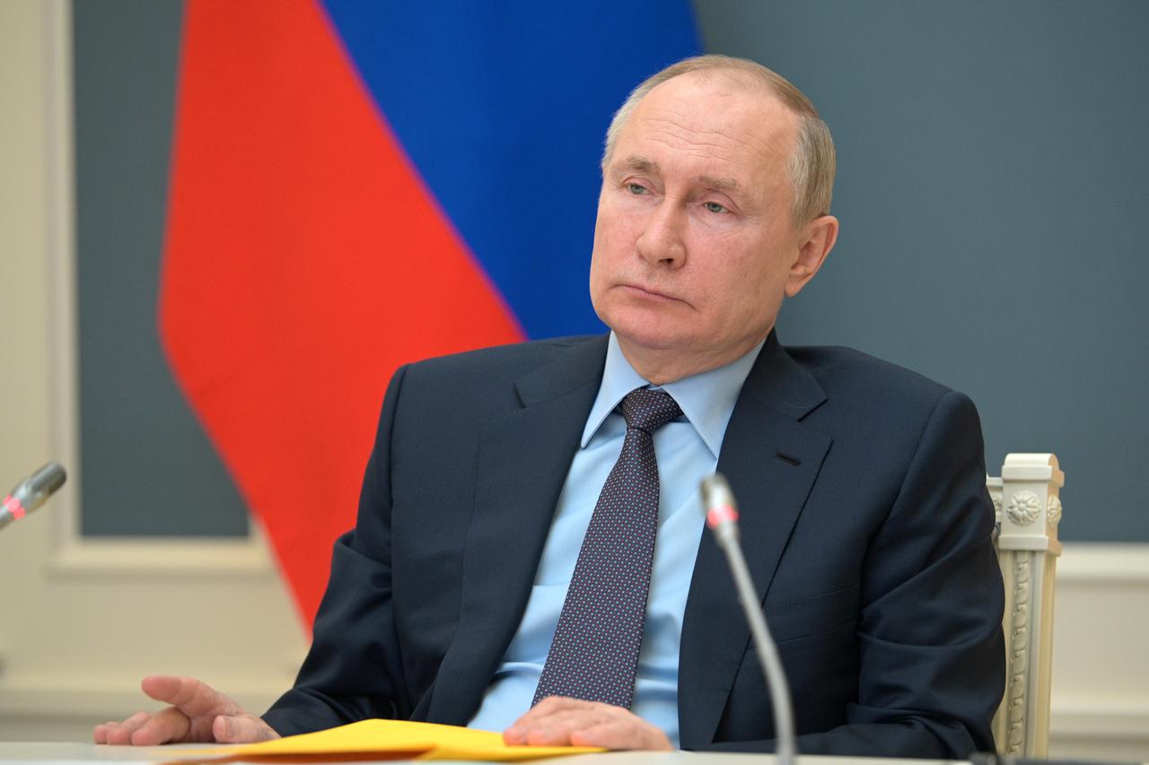 FILE PHOTO: Russian President Putin attends a session of the Russian Geographical Society in Moscow