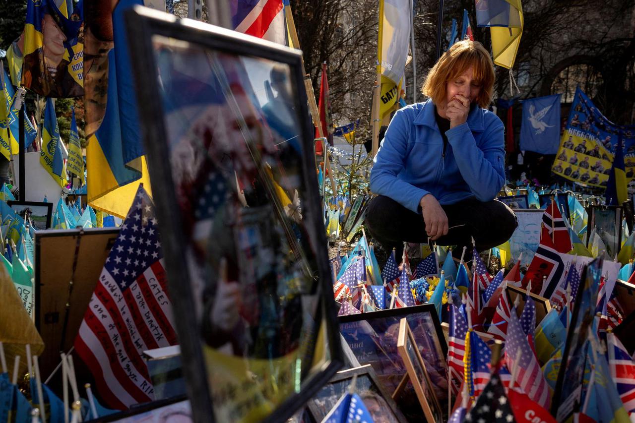 U.S. volunteers commemorate fallen U.S. fighters who fought with the Ukrainian army in Kyiv