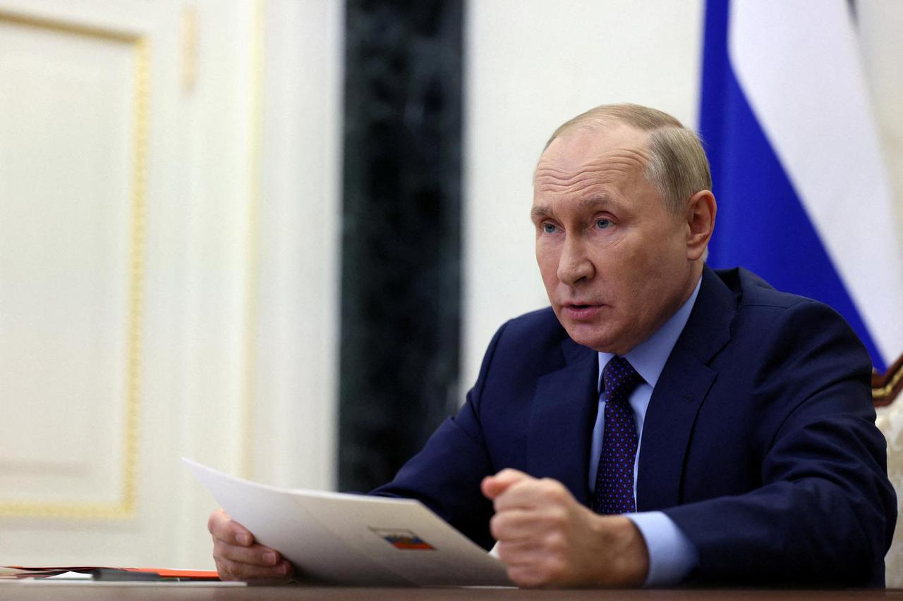 FILE PHOTO: Russian President Vladimir Putin chairs a meeting in Moscow