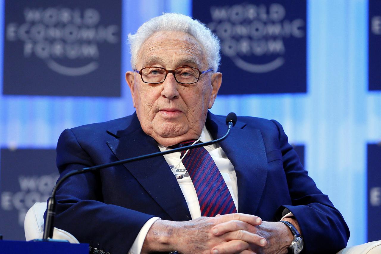 FILE PHOTO: Kissinger, chairman of Kissinger Associates, attends the annual meeting of the World Economic Forum in Davos